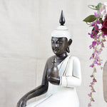 Ekaurr Ivory Grace Buddha handcrafted ceramic figurine in soft ivory finish with a graceful meditative posture, spiritual home decor sculpture for shelves or sacred spaces