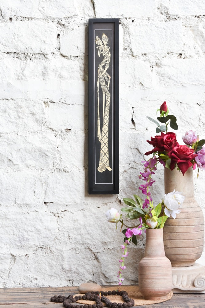 Ekaurr Javanese Elegance Golden Embrace framed wall art depicting a traditional Javanese embracing figure in rich gold and warm tones, handcrafted cultural home decor for living rooms and globally inspired interiors