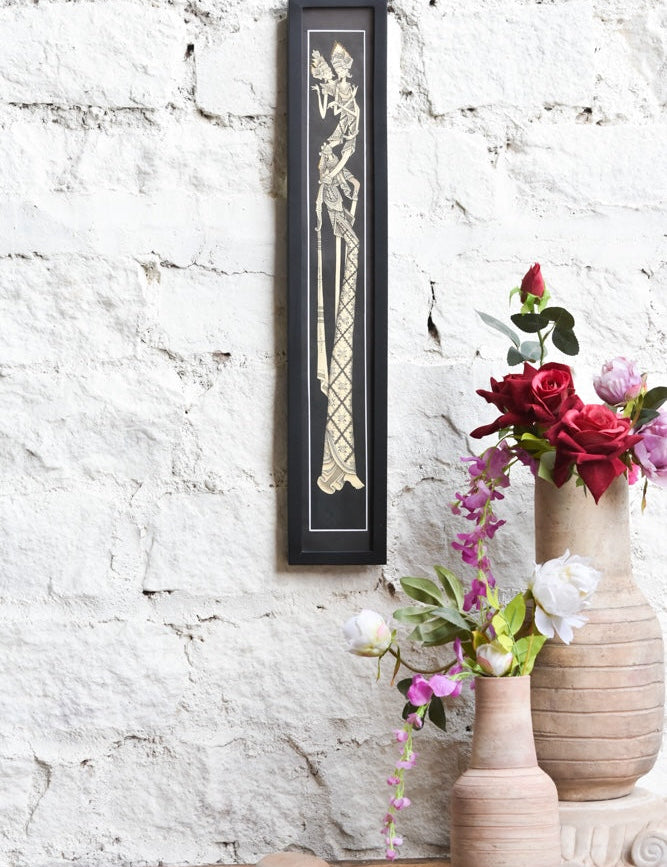 Ekaurr Javanese Elegance Golden Embrace framed wall art depicting a traditional Javanese embracing figure in rich gold and warm tones, handcrafted cultural home decor for living rooms and globally inspired interiors