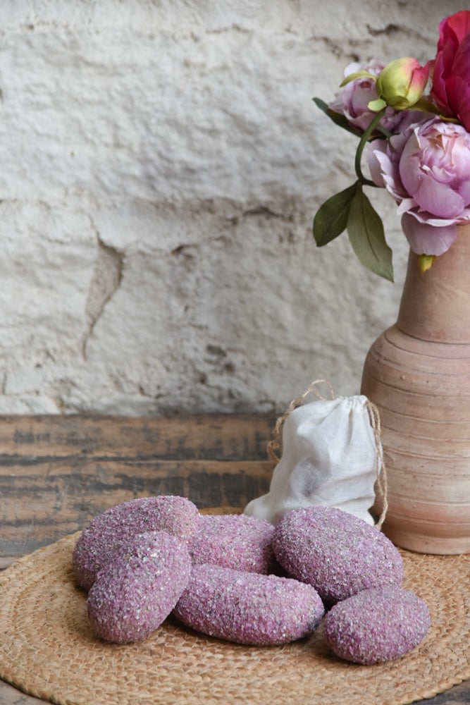 Ekaurr Jewels of Ruby Glow Decorative Stone natural stone cladded with ruby granules radiating a warm jewel-toned glow, luxury artisan decorative accent for desks shelves and gifting
