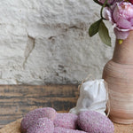 Ekaurr Jewels of Ruby Glow Decorative Stone natural stone cladded with ruby granules radiating a warm jewel-toned glow, luxury artisan decorative accent for desks shelves and gifting