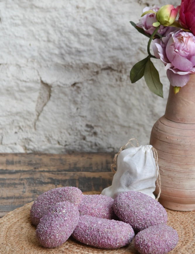 Ekaurr Jewels of Ruby Glow Decorative Stone natural stone cladded with ruby granules radiating a warm jewel-toned glow, luxury artisan decorative accent for desks shelves and gifting