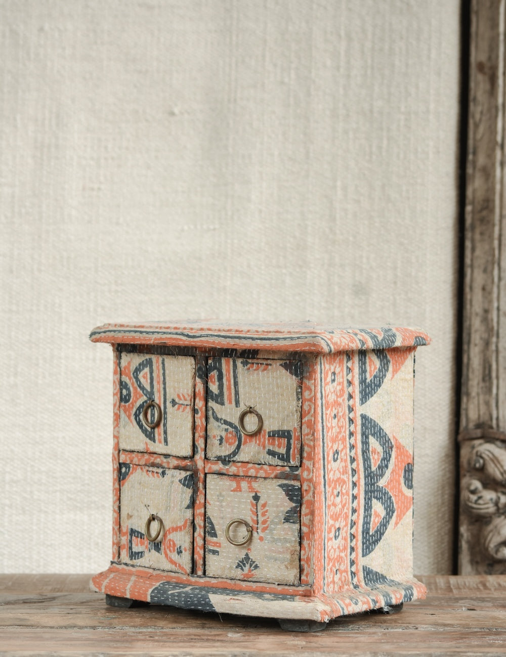 Close-up of Ekaurr Kantha Cladded Chest showing intricate Kantha embroidery and fabric texture on drawer fronts