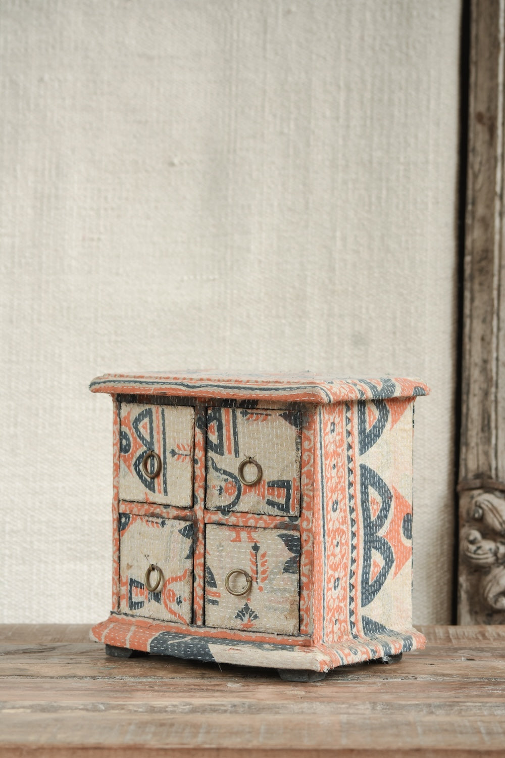Close-up of Ekaurr Kantha Cladded Chest showing intricate Kantha embroidery and fabric texture on drawer fronts