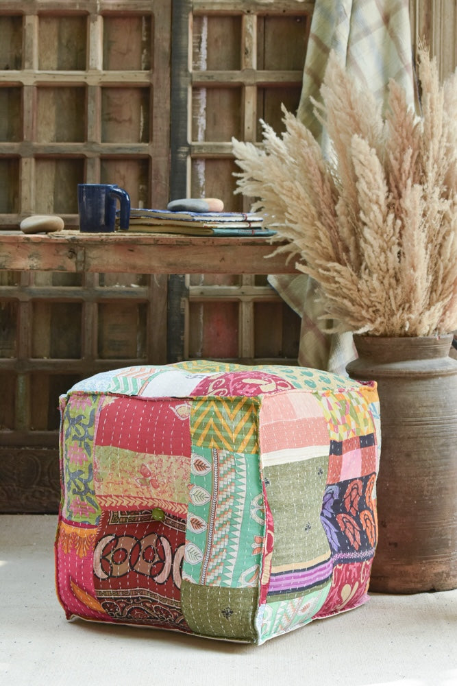 Ekaurr Kantha Patchwork Pouffe handcrafted upholstered floor pouffe covered in colourful layered kantha patchwork fabric, artisan textile seating or footrest for boho and eclectic home interiors