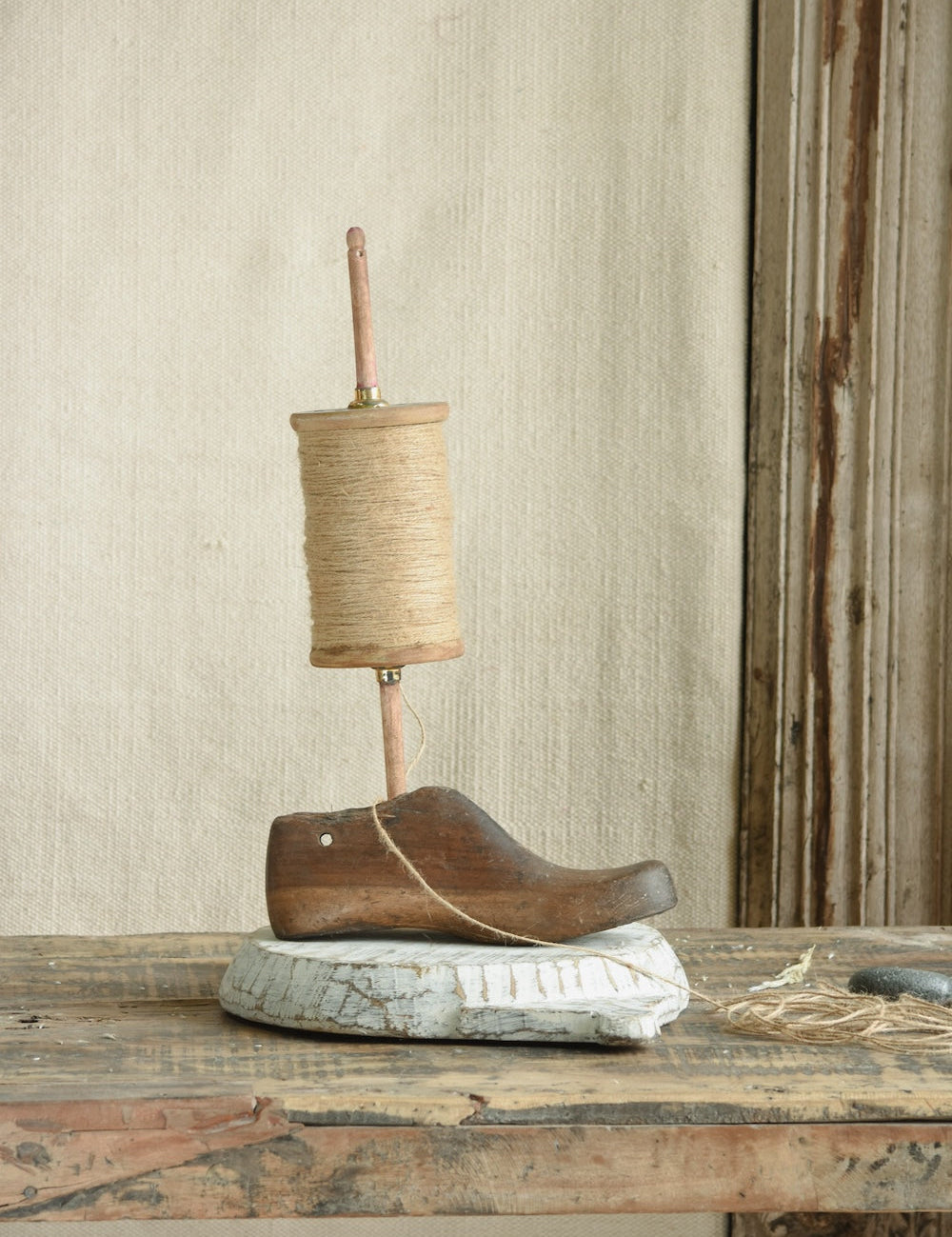 Ekaurr Kite Spool with Jute Rope on Shoe Mould Base vintage wooden kite spool wound with jute cord displayed on a cobbler shoe mould base, nostalgic found object artisan decor for shelves