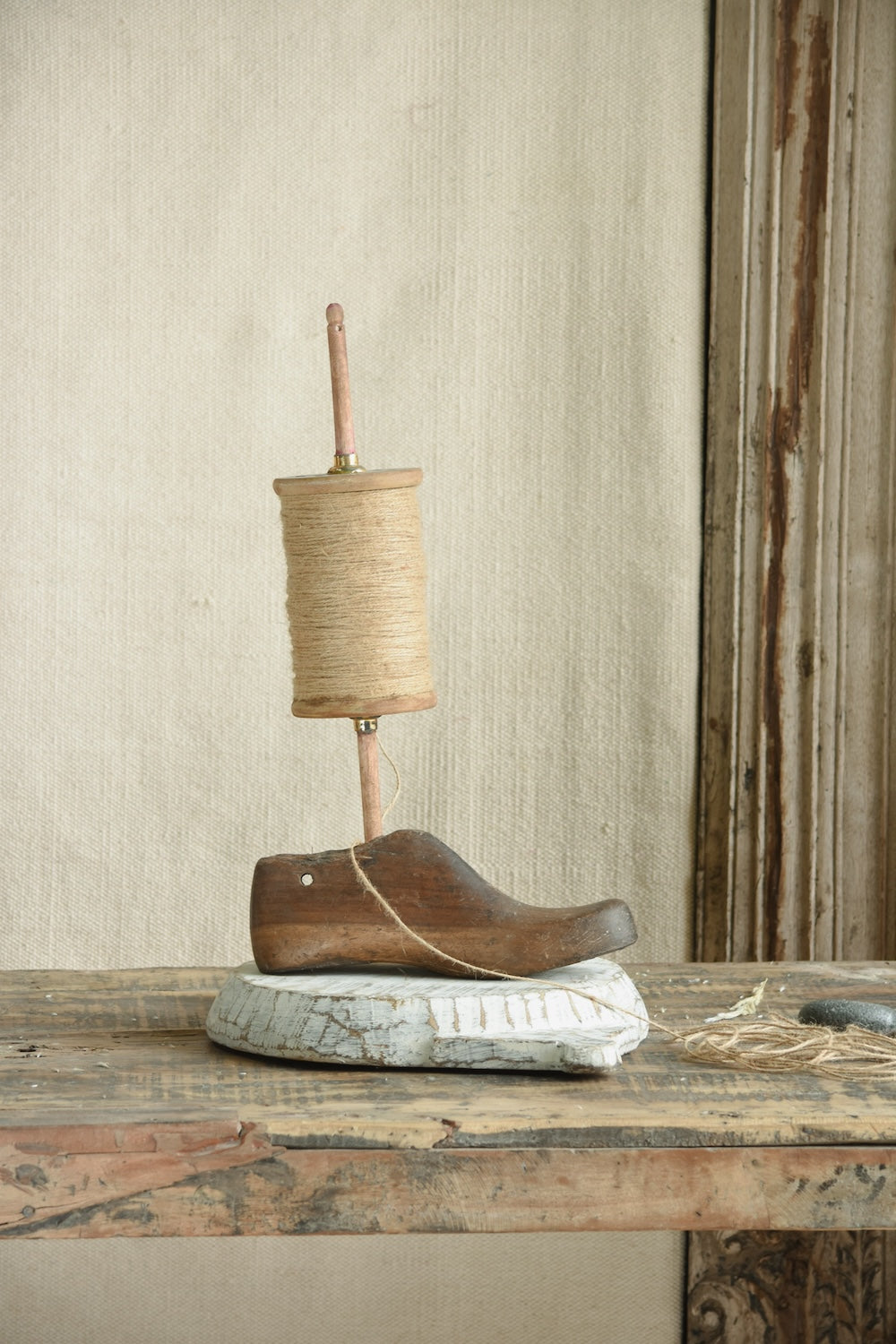 Ekaurr Kite Spool with Jute Rope on Shoe Mould Base vintage wooden kite spool wound with jute cord displayed on a cobbler shoe mould base, nostalgic found object artisan decor for shelves