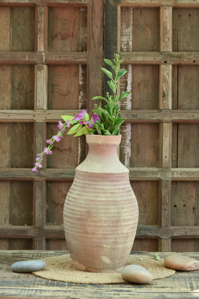 Ekaurr Lata Vaasi Terracotta Planter handmade by rural Indian women artisans in slender creeper-inspired form, natural terracotta finish for succulents or decorative styling