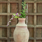 Ekaurr Lata Vaasi Terracotta Planter handmade by rural Indian women artisans in slender creeper-inspired form, natural terracotta finish for succulents or decorative styling