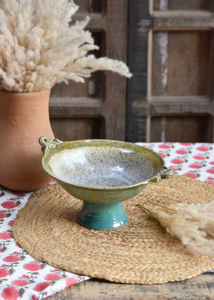 Ekaurr Fruit Bowl handmade ceramic by artist Liora in organic form with hand-glazed surface at 9.5x7.5x4 inches, microwave and oven safe artisan charity collection piece for kitchens and dining styling