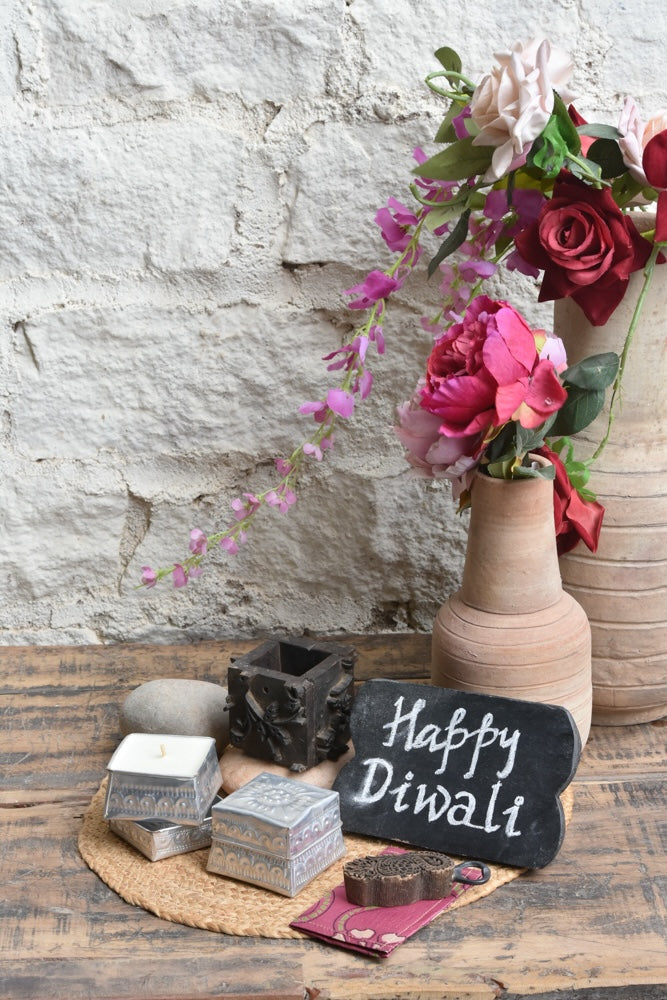 Ekaurr Little Joys Gift Set curated artisan gift of an emblem chalkboard a vintage print block cutlery stand a print block bottle opener two hand-poured candles in aluminium containers four decorative pebble stones and a greeting card at Rs.5100, playful sustainable gifting celebrating Indian print block craft