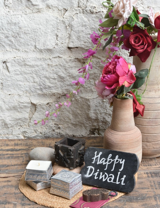 Ekaurr Little Joys Gift Set curated artisan gift of an emblem chalkboard a vintage print block cutlery stand a print block bottle opener two hand-poured candles in aluminium containers four decorative pebble stones and a greeting card at Rs.5100, playful sustainable gifting celebrating Indian print block craft