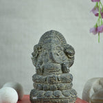 Ekaurr Lotus Wisdom Lord Ganesha idol in earthy raw stone finish seated on lotus base, minimalist devotional figurine for desks shelves and pooja spaces