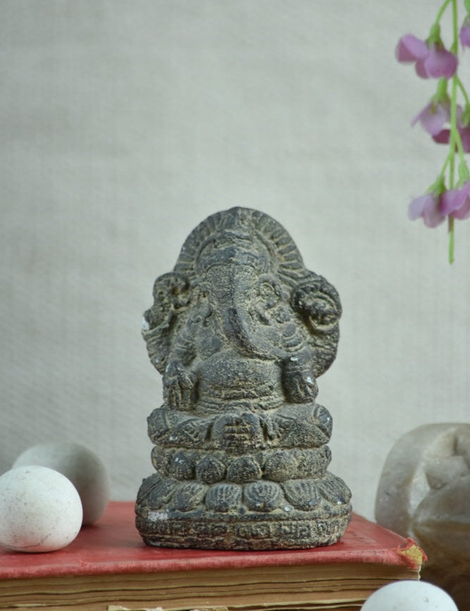 Ekaurr Lotus Wisdom Lord Ganesha idol in earthy raw stone finish seated on lotus base, minimalist devotional figurine for desks shelves and pooja spaces