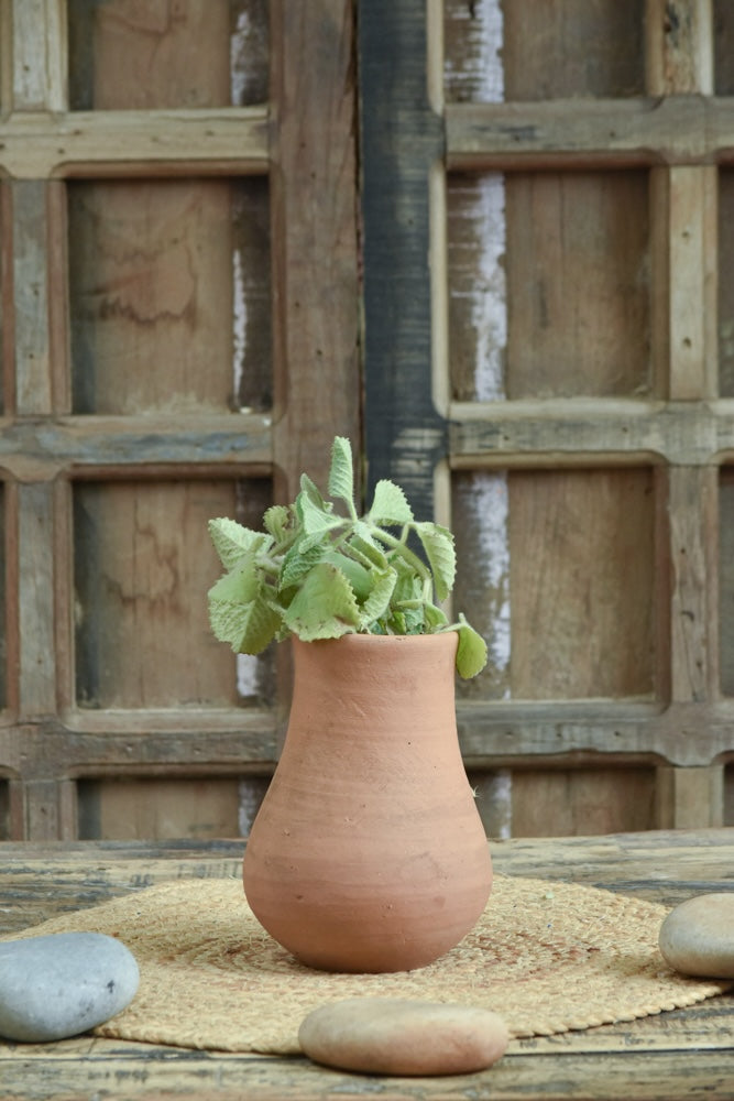 Ekaurr Matka Inspired Curve Terracotta Pot handmade by rural Indian women artisans with a gentle curved matka silhouette, natural earthy finish for plants or decorative display