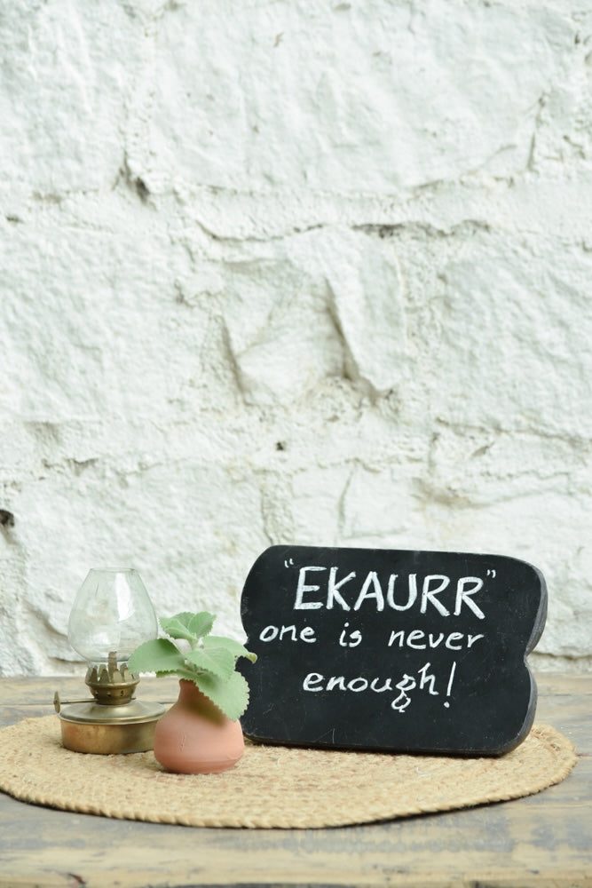 Ekaurr Mini Glow Gift Set curated artisan gift set including a vintage brass-finish glass lantern a hand-shaped terracotta mini pot and a wooden emblem signboard with complimentary greeting card, warm sustainable gifting for home decor and thoughtful occasions