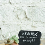 Ekaurr Mini Glow Gift Set curated artisan gift set including a vintage brass-finish glass lantern a hand-shaped terracotta mini pot and a wooden emblem signboard with complimentary greeting card, warm sustainable gifting for home decor and thoughtful occasions