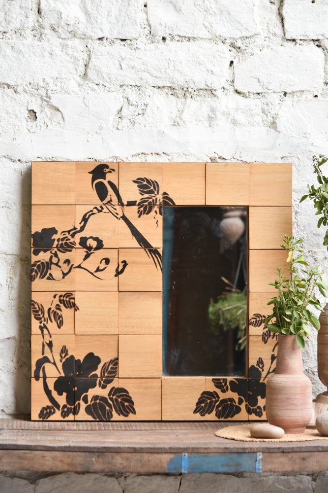 Ekaurr Morning Perch Mirror hand-painted bird on a blooming branch across individually grained reclaimed wood tiles framing a clear mirror panel at 30x30 inches, artisan one-of-a-kind wall mirror for living rooms and entryways