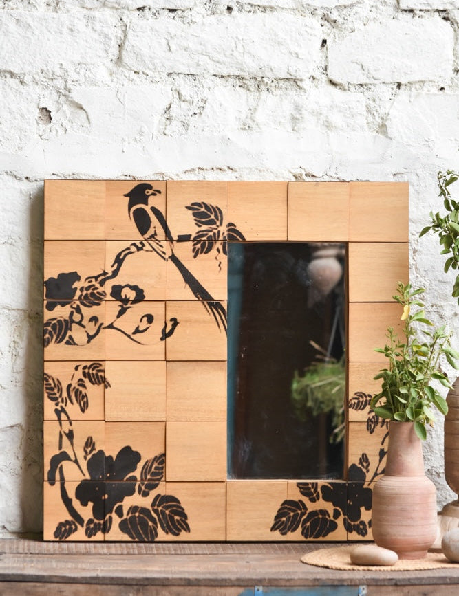 Ekaurr Morning Perch Mirror hand-painted bird on a blooming branch across individually grained reclaimed wood tiles framing a clear mirror panel at 30x30 inches, artisan one-of-a-kind wall mirror for living rooms and entryways