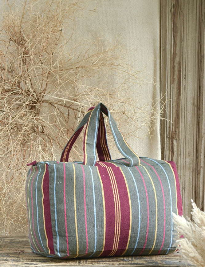 Ekaurr Multi Coloured Fabric Picnic Bag handcrafted quilted cotton picnic tote in a vibrant multicolour patchwork or print with a spacious structured form, artisan Indian textile bag for picnics outings and joyful everyday use
