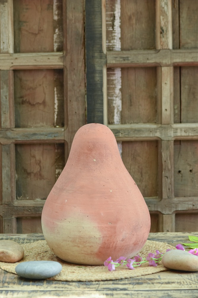 Ekaurr Naashpati Form Decorative handcrafted terracotta accent in an organic pear-inspired silhouette with unglazed raw clay surface, earthy one-of-a-kind shelf or console accent
