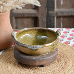 Ekaurr Olive Serving Bowl handmade ceramic serving bowl in earthy olive green glaze with organic hand-thrown form, artisan kitchen essential from the Liora charity collection for dining and table styling