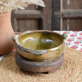 Ekaurr Olive Serving Bowl handmade ceramic serving bowl in earthy olive green glaze with organic hand-thrown form, artisan kitchen essential from the Liora charity collection for dining and table styling