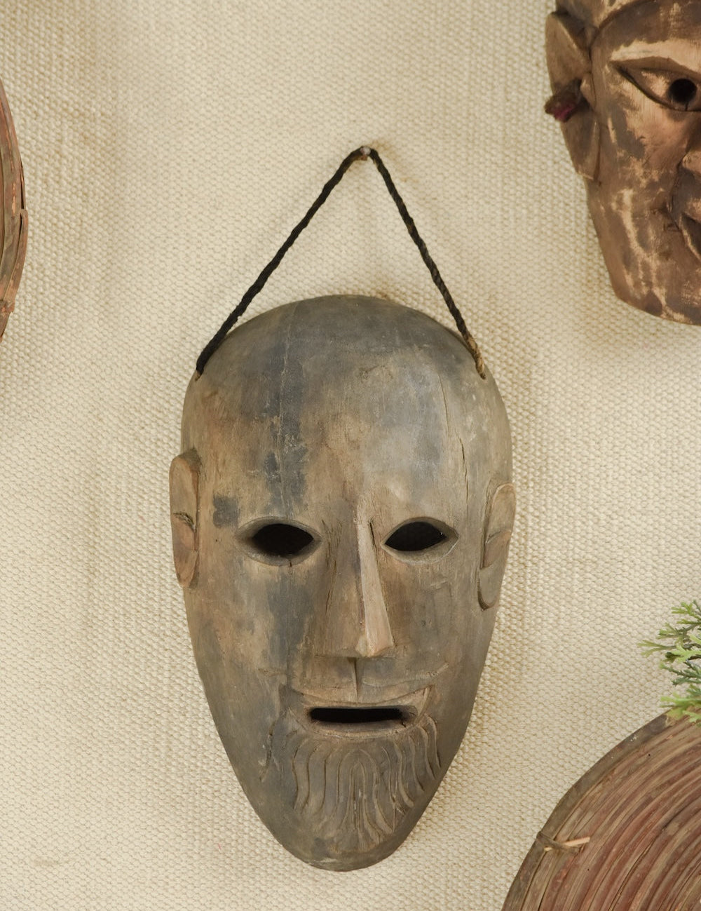 Ekaurr One of a Kind Elderwood Mask hand-carved aged wood tribal or ceremonial mask with deeply weathered surface and natural elderwood character, one-of-a-kind artisan wall decor for collectors and curated interiors