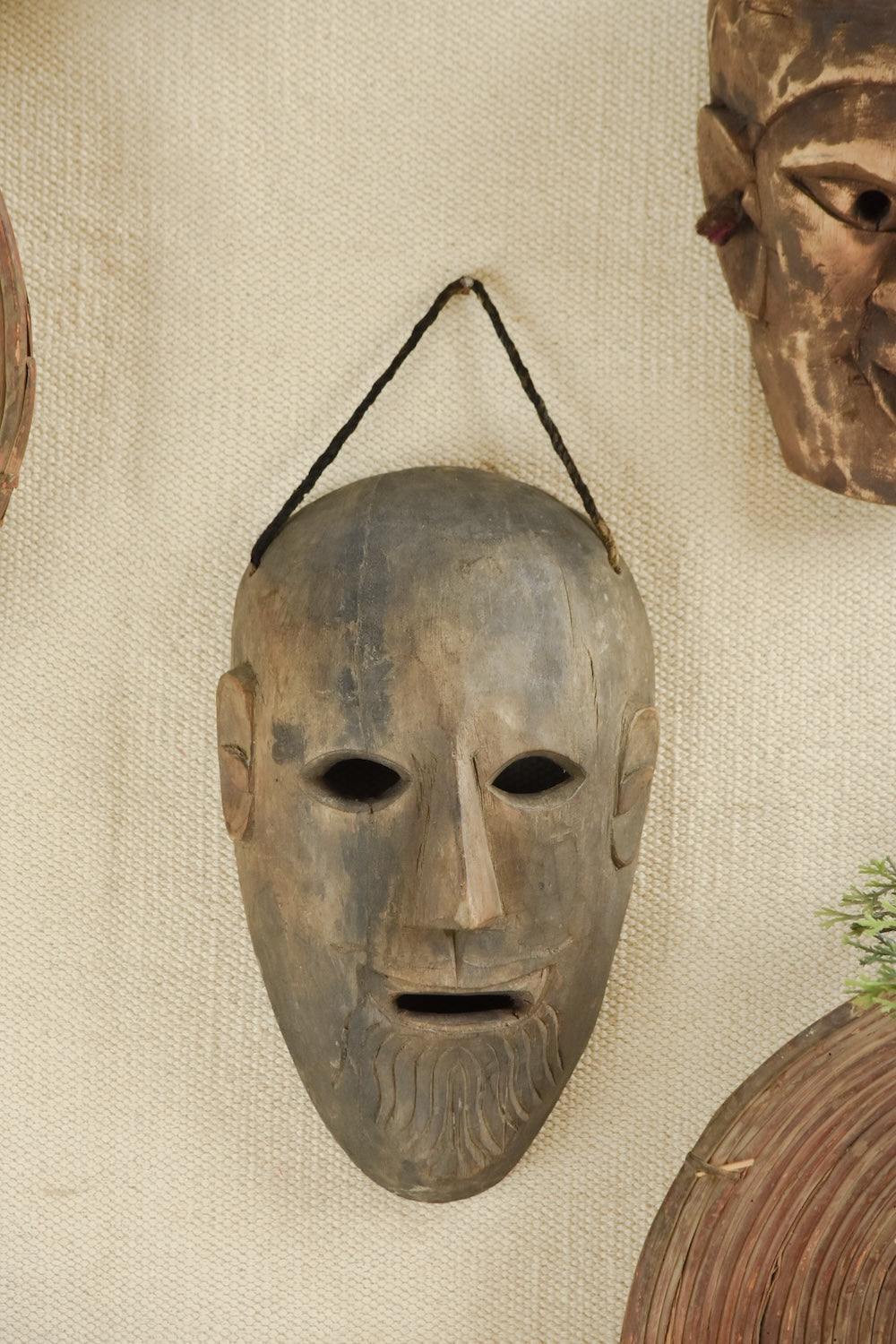 Ekaurr One of a Kind Elderwood Mask hand-carved aged wood tribal or ceremonial mask with deeply weathered surface and natural elderwood character, one-of-a-kind artisan wall decor for collectors and curated interiors