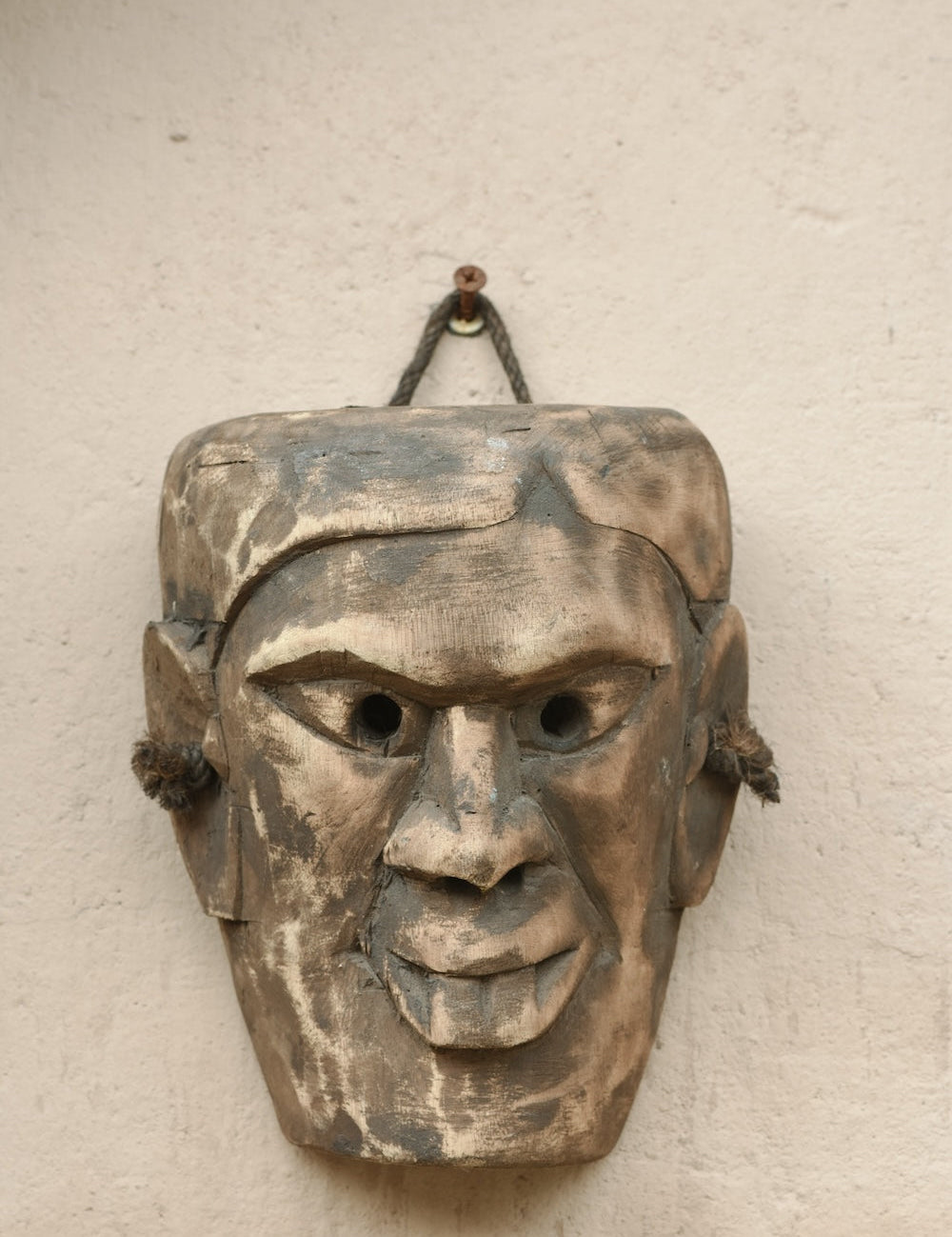 Ekaurr One of a Kind Tribal Mask hand-carved wood tribal ceremonial mask with bold expressive features and natural earthy finish, unique artisan one-of-a-kind wall decor for collectors and curated home interiors