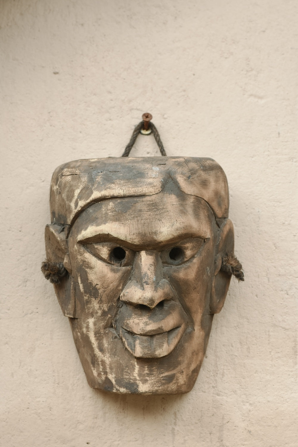 Ekaurr One of a Kind Tribal Mask hand-carved wood tribal ceremonial mask with bold expressive features and natural earthy finish, unique artisan one-of-a-kind wall decor for collectors and curated home interiors