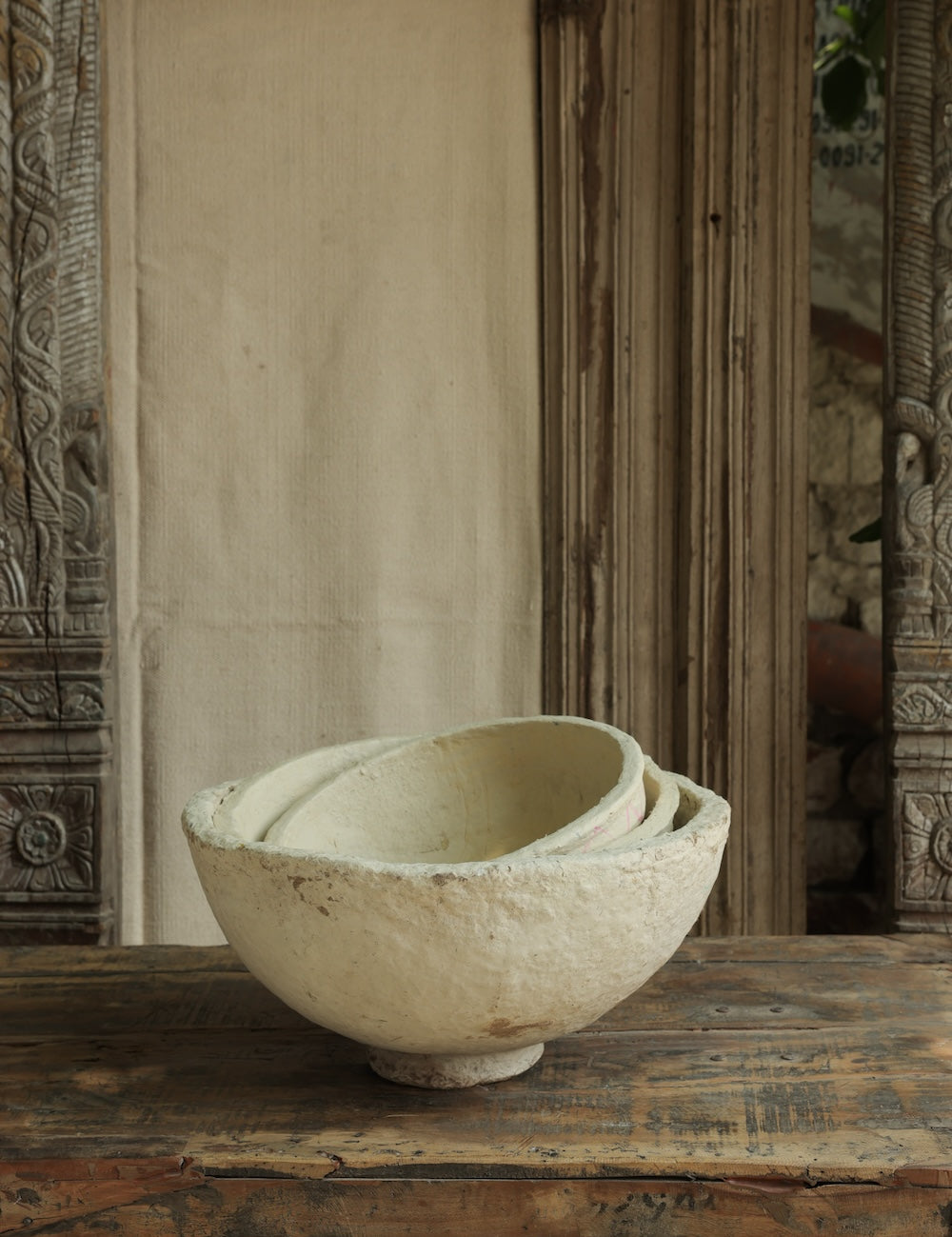 Ekaurr paper mache bowls in three sizes displayed open showing colorful hand-painted interior and artisanal finish