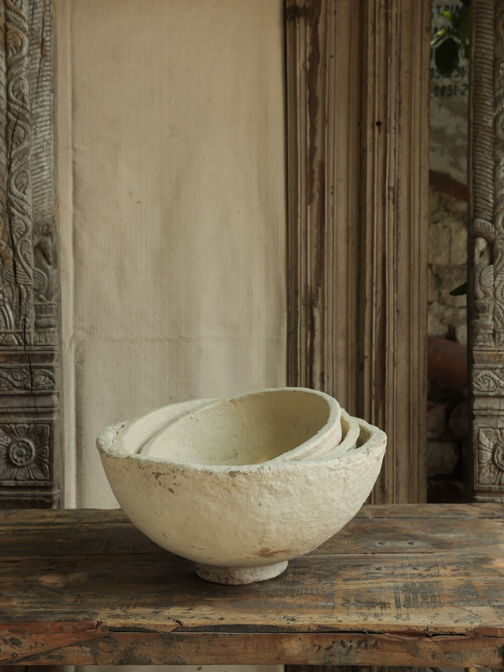 Ekaurr paper mache bowls in three sizes displayed open showing colorful hand-painted interior and artisanal finish