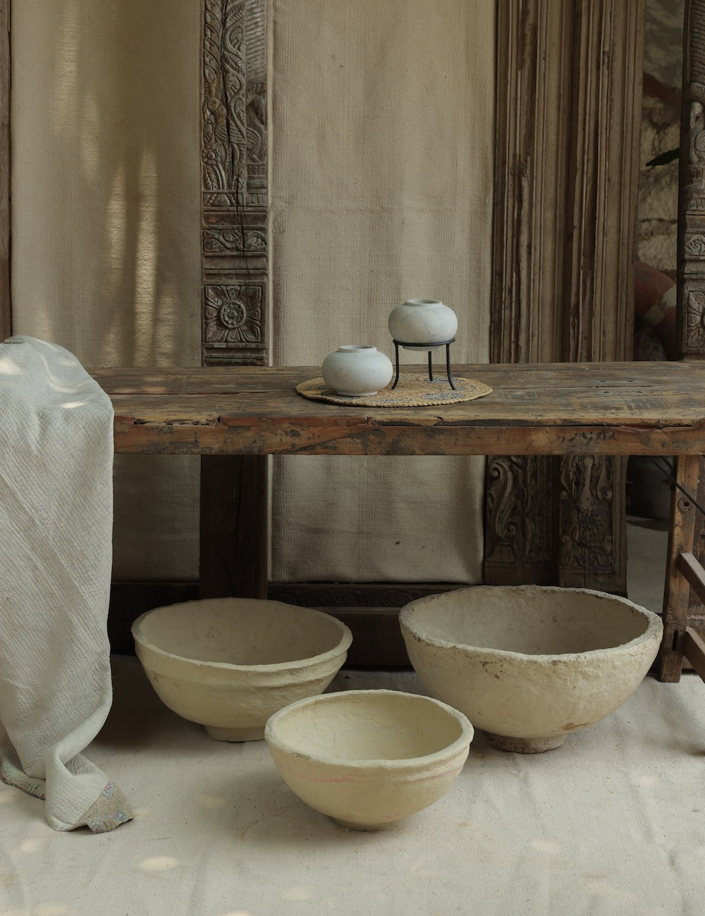 Ekaurr paper mache bowls in three sizes displayed open showing colorful hand-painted interior and artisanal finish