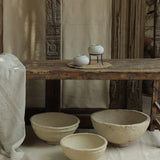 Ekaurr paper mache bowls in three sizes displayed open showing colorful hand-painted interior and artisanal finish