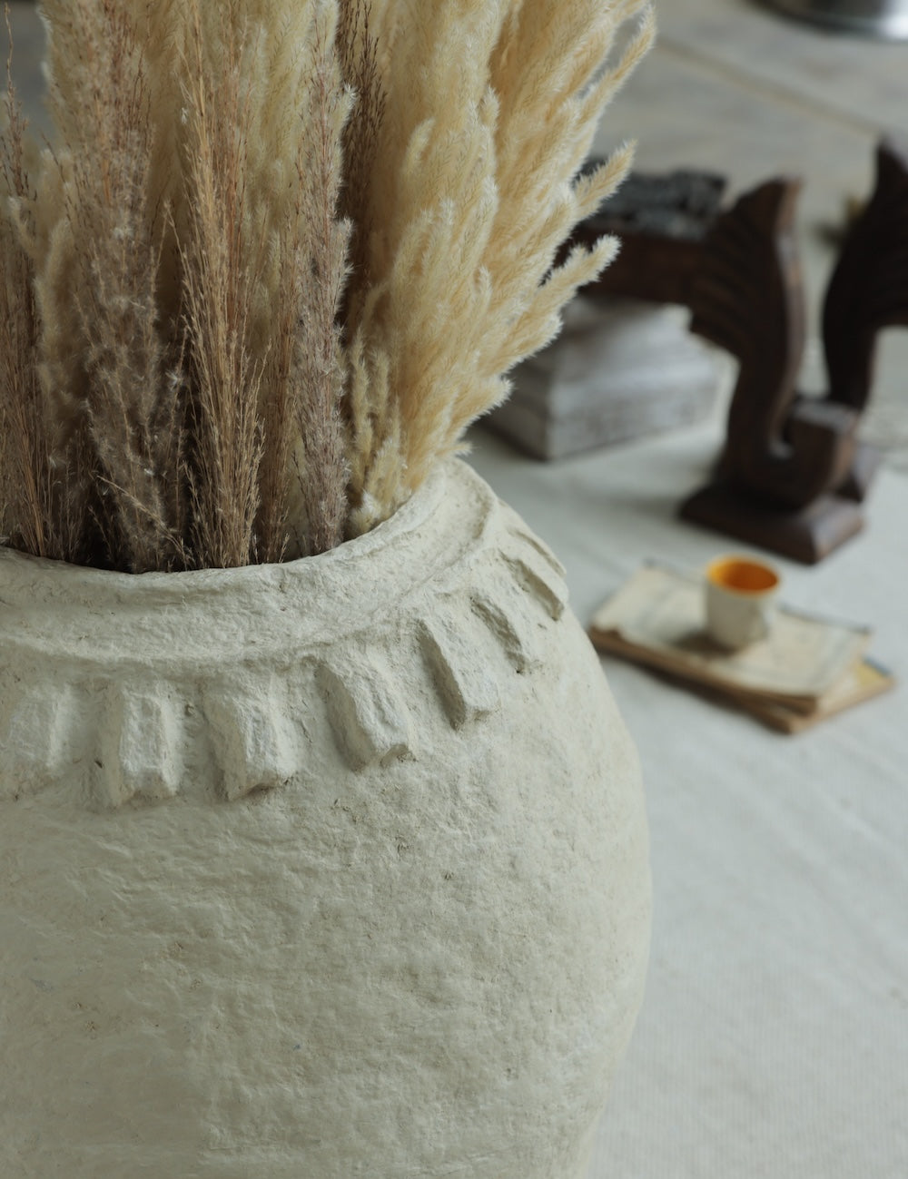 Ekaurr Paper Mache Round Pot styled for interior display showing organic textured surface traditional papier mache craft by Indian women artisans