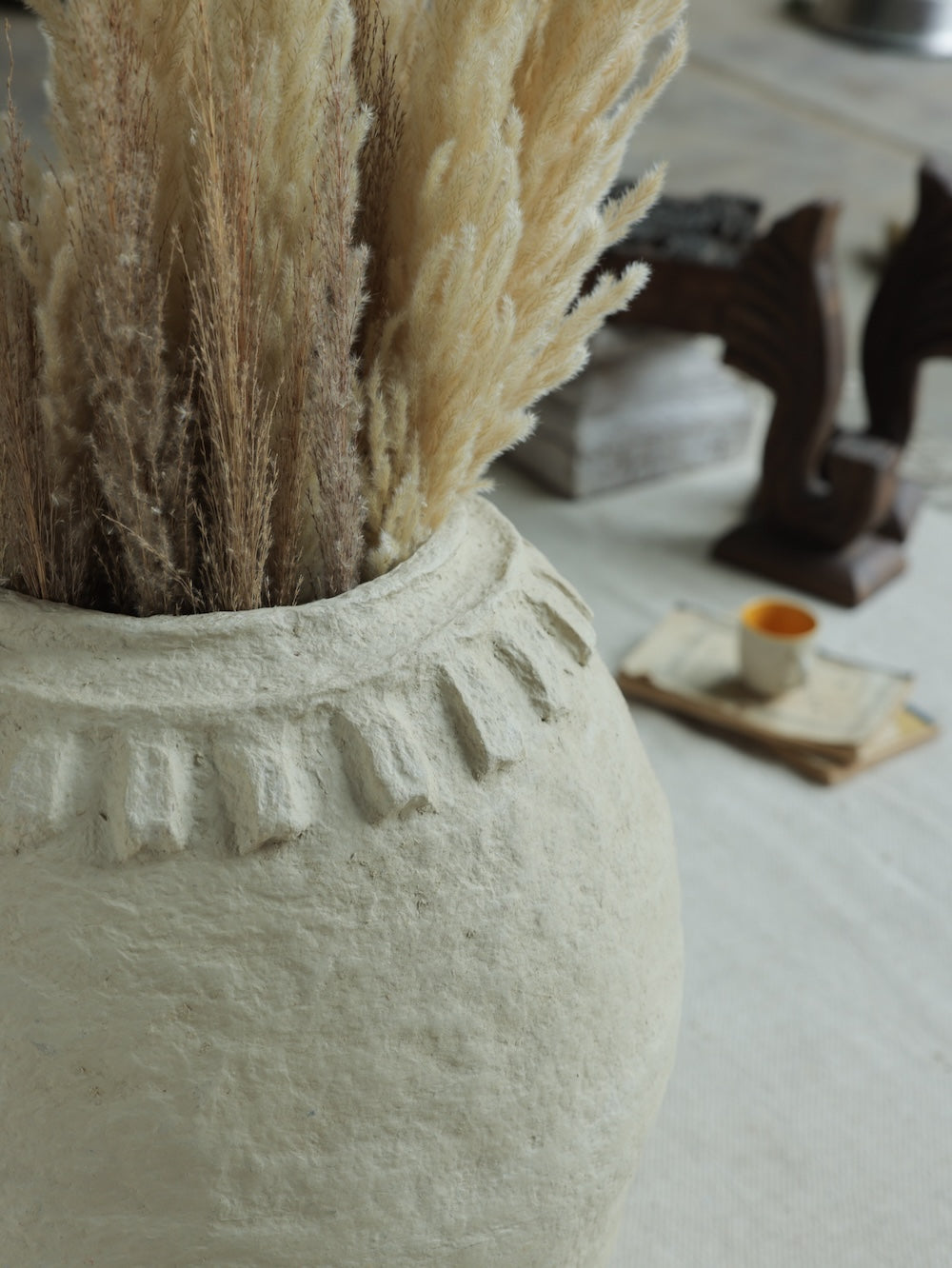 Ekaurr Paper Mache Round Pot styled for interior display showing organic textured surface traditional papier mache craft by Indian women artisans