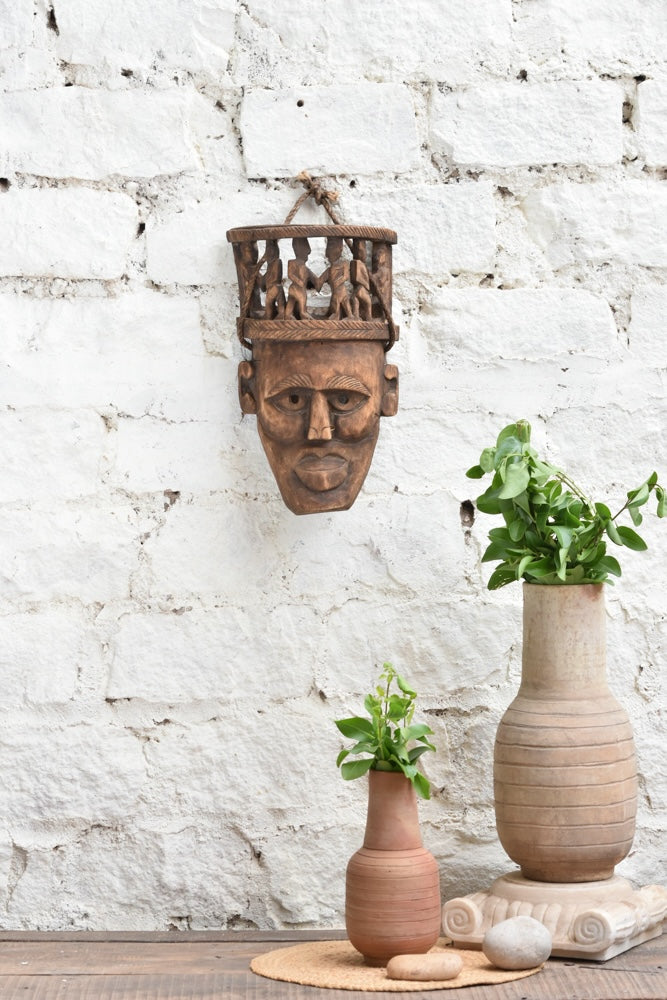Ekaurr Peace Maker Circle of Kin Tribal Bond hand-carved wooden wall mask showing multiple connected figures, vintage one-of-a-kind tribal community décor