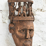 Ekaurr Peace Maker Tribal Bond Mask side view showing carved depth, figure detail and aged wood patina