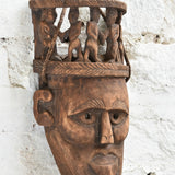 Ekaurr Peace Maker Tribal Bond Mask side view showing carved depth, figure detail and aged wood patina