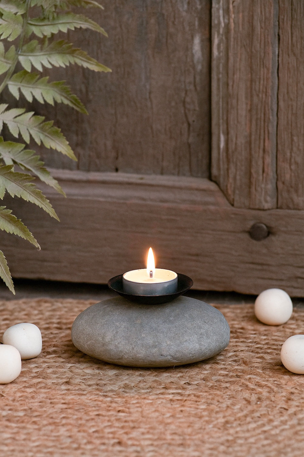 Ekaurr Pebble Tea Light Holder smooth natural river pebble with carved tea light well, organic stone candle holder for minimal and nature-inspired home decor