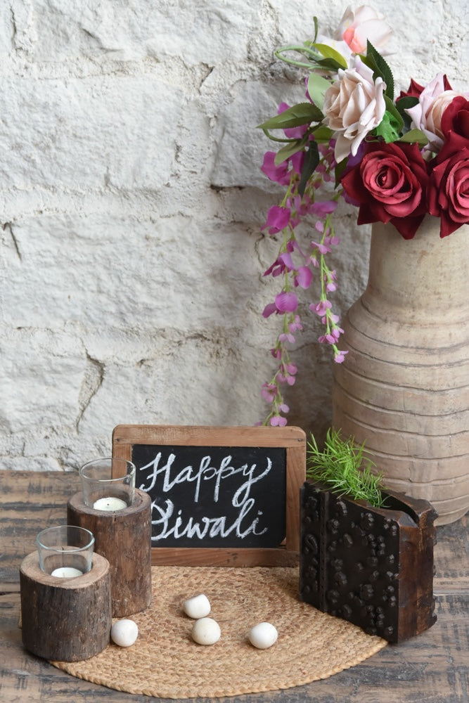 Ekaurr Pebbles Petals and Flame Gift Set curated artisan gift set combining natural river pebbles dried botanical petals and handcrafted tea light holders with complimentary greeting card, organic sustainable gifting for nature-inspired home styling