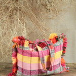 Ekaurr Pink Threaded Tales Bag with Fringes handcrafted kantha or patchwork fabric tote in pink tones with tassel fringe detailing, artisan Indian textile accessory for everyday use and boho-inspired conscious styling