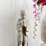 Ekaurr Praying Monk handcrafted ceramic figurine with hands folded in prayer, artisan spiritual sculpture evoking devotion and stillness for home altars and shelves