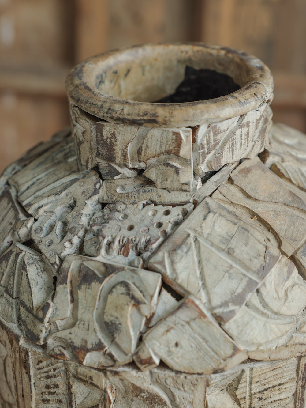 Close-up of Ekaurr Print Block Cladded Iron Pot showing intricate hand-carved wood block pattern mosaic on iron body rustic artisan craft