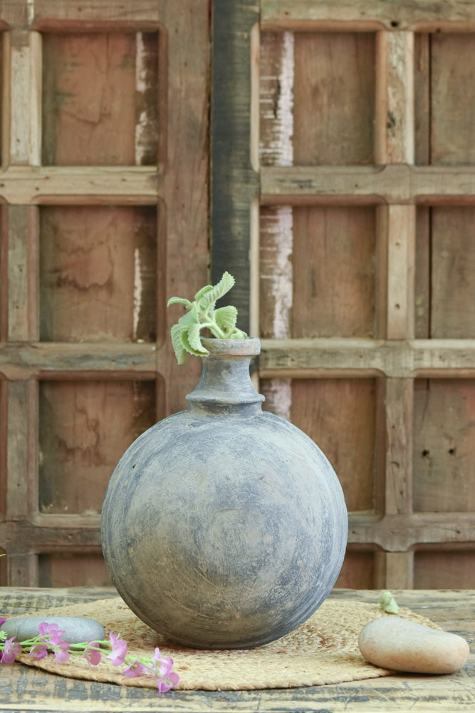 Ekaurr Purna Gola Terracotta Planter handmade by rural Indian women artisans in full rounded globe form, natural earthy terracotta for indoor or outdoor plant display