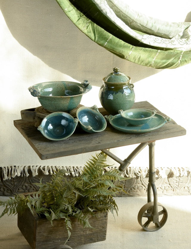 Ekaurr Reclaimed Wood Rolling Coffee Table with industrial metal wheels and built-in wooden storage crate base, rustic farmhouse design