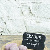Ekaurr Ruby Essence Gift Set curated artisan gift set including a ruby-cladded natural stone paperweight and a rustic wooden emblem chalkboard with complimentary greeting card, luxury sustainable gifting for desks and home styling