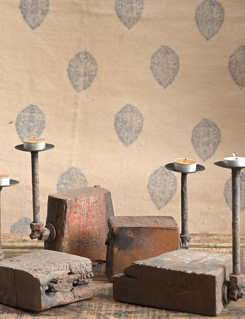 Ekaurr Rustic Timber Charm Tea Light Holder – reclaimed wood block with aged iron rod, warm ambient glow