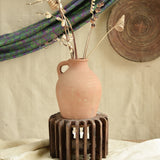Ekaurr The Sanchey Circles styled with terracotta pots as planters, showing rustic botanical eco-conscious art installation
